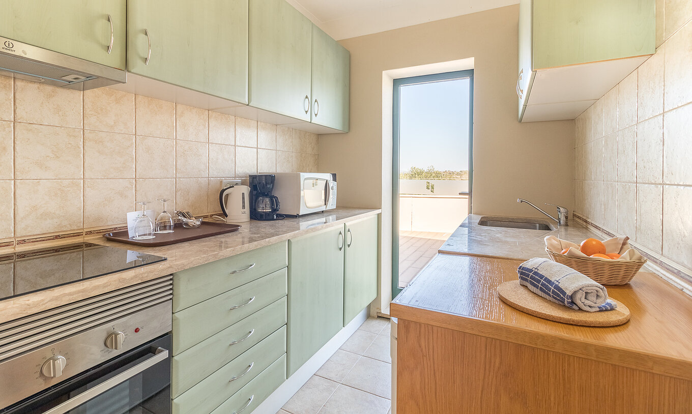 Das Studio im Pestana Gramacho Residences hat eine moderne Küche mit Geräten und Zugang zum Balkon
