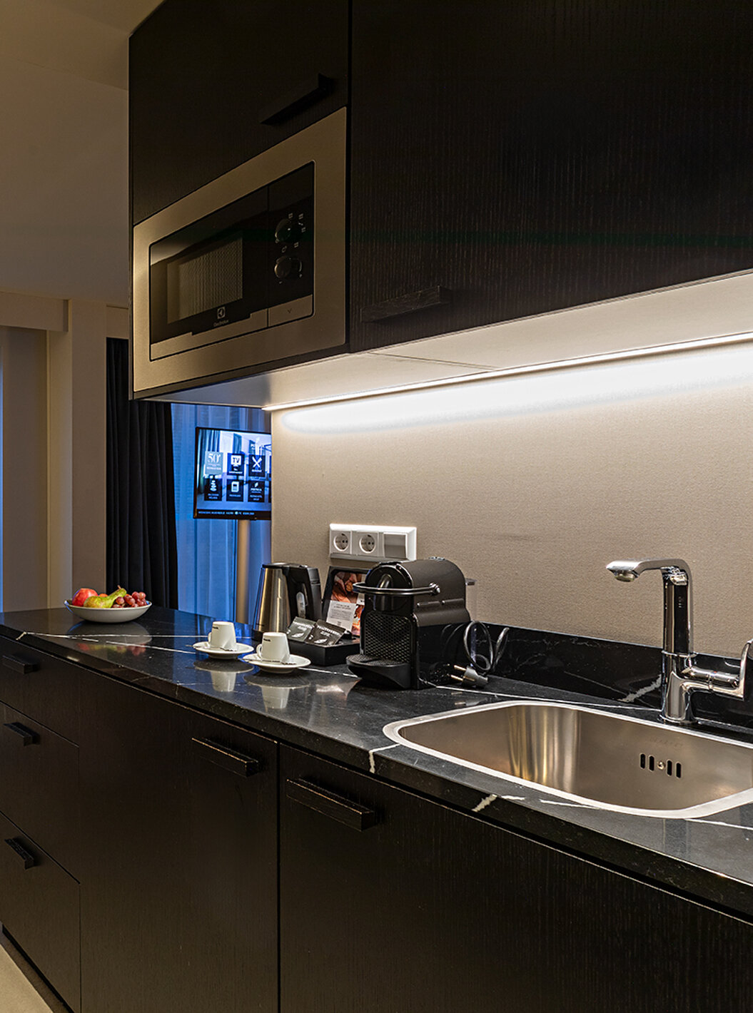 Das Premium Studio Zimmer im Pestana Amsterdam Riverside hat eine Küchenzeile