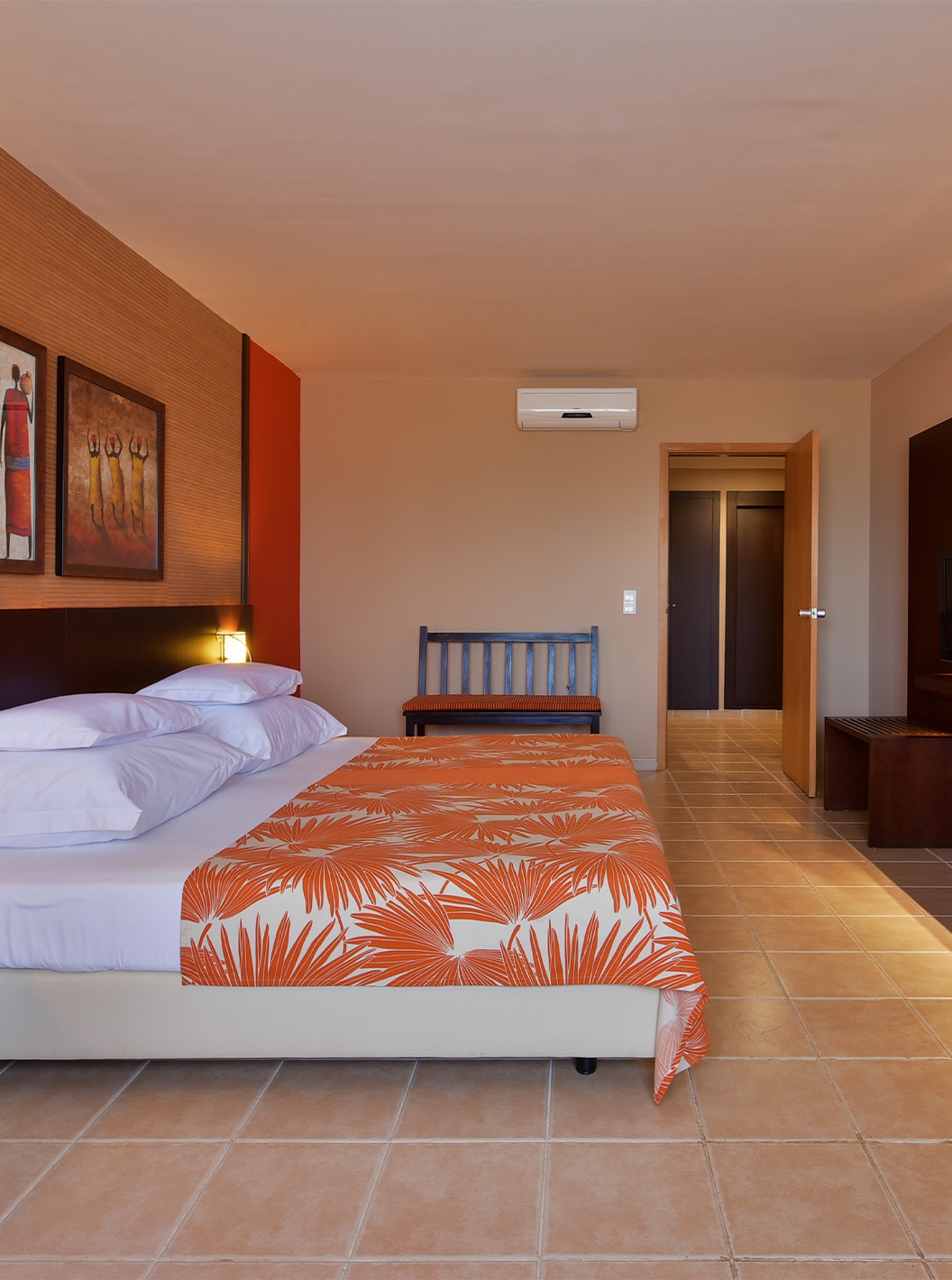 The Classic Sea View room at Pestana Tropico features a double bed, television, bedside table, mirror, and air conditioning