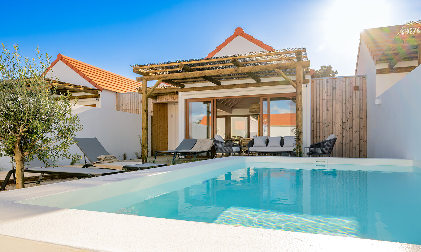 The Superior Green Villa at Pestana Comporta Village Residences has an exterior with a pool and several sun loungers