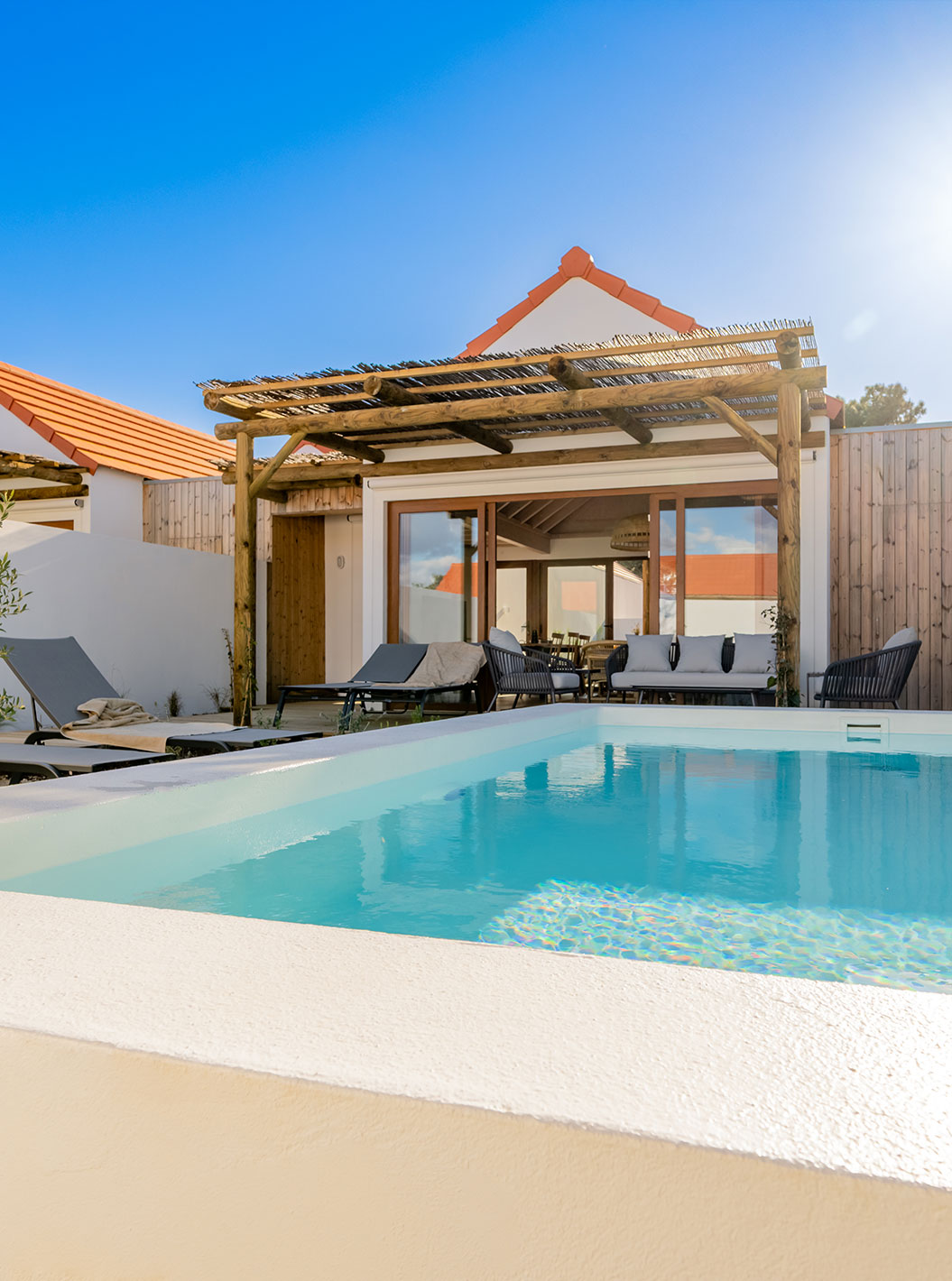 The Superior Villa at Pestana Comporta Village Residences has an exterior with a pool and several sun loungers