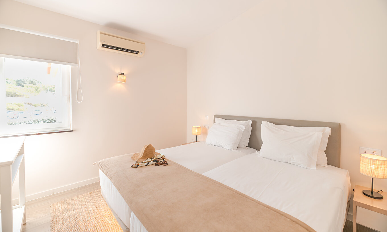 Villa 1 Bedroom Garden View at Pestana Alvor Beach Villas has a double bed, air conditioning and a window