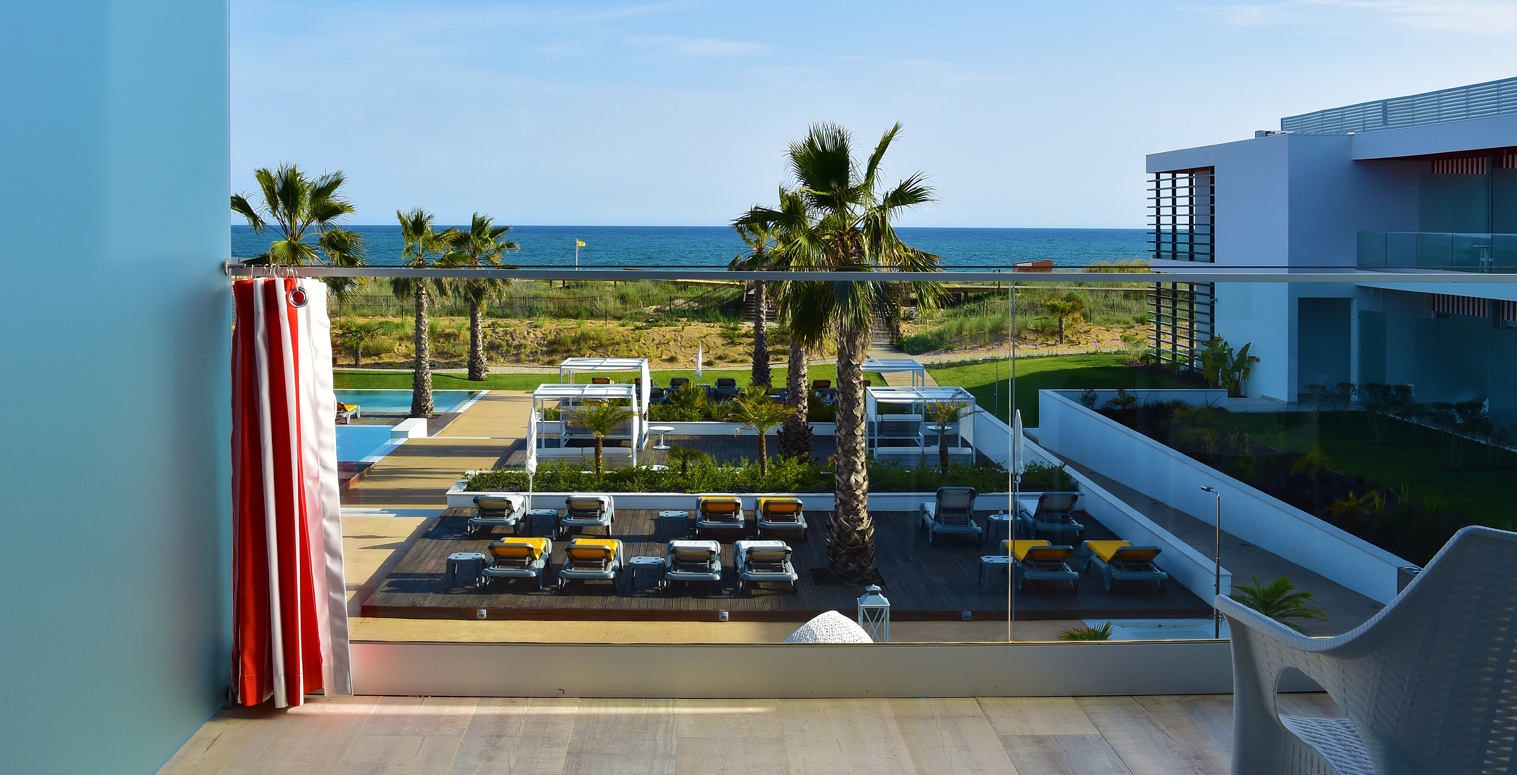 The Deluxe Balcony Sea or Pool View - Exclusive Website of Pestana Alvor South Beach has a balcony with beach view