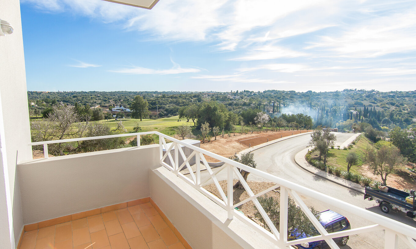 The T1 Apartment at Pestana Gramacho Residences includes a balcony with a view of the road and the golf course