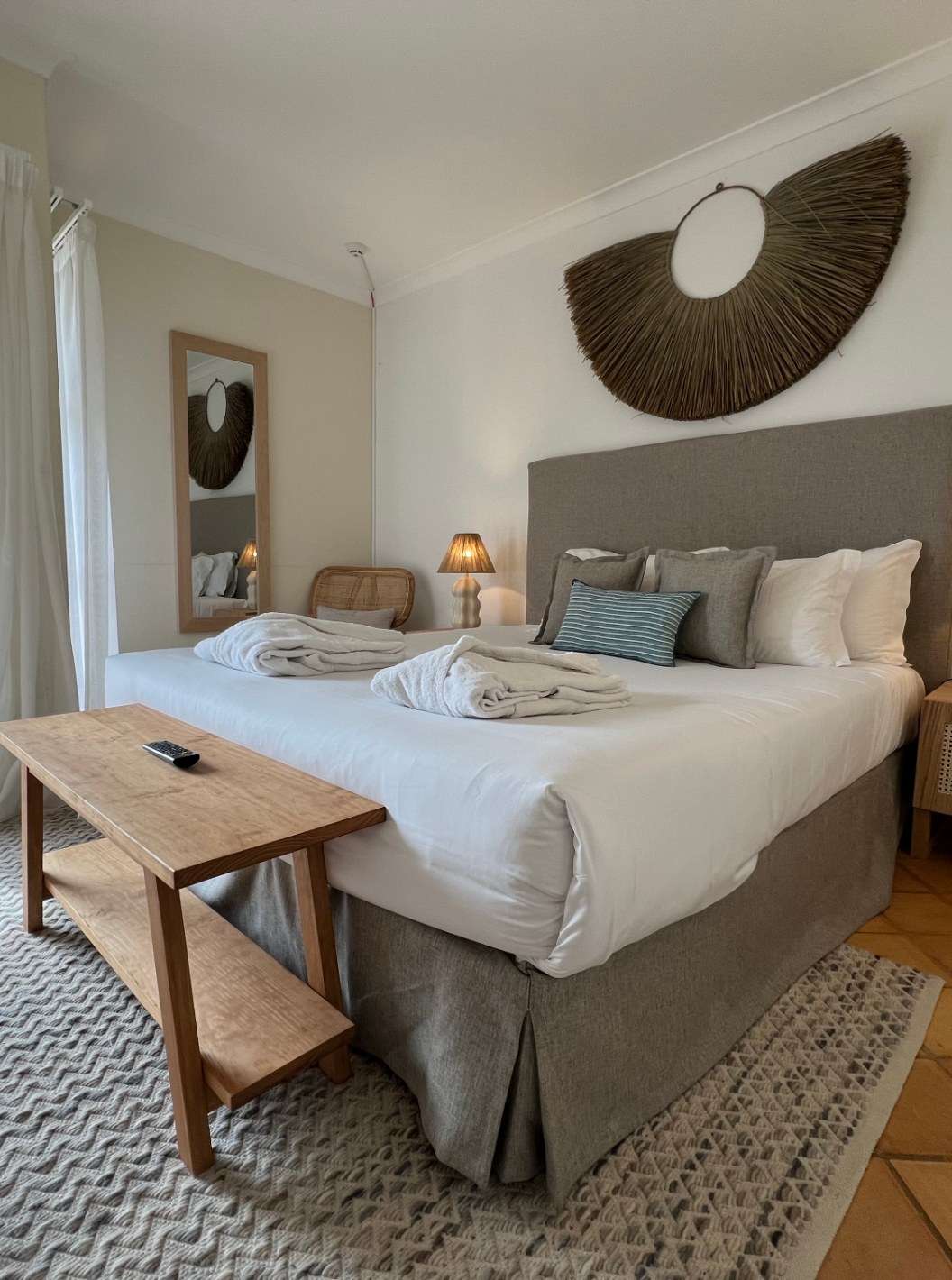 Premium Two-Bedroom Apartment at Pestana Palm Gardens with double bed, bedside lamps and balcony curtains