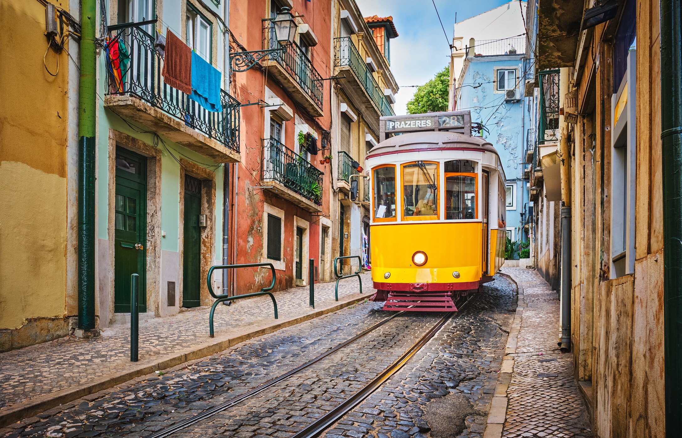 Alfama, the oldest neighborhood in Lisbon, enchants with its narrow streets, colorful houses, and the tram 28
