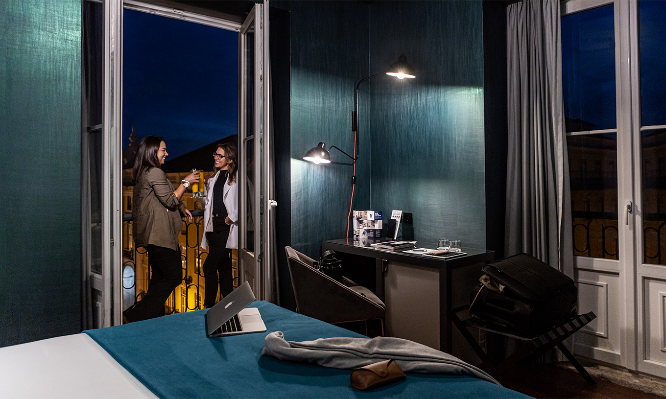 In the CR7 Superior Corner Room at Pestana CR7 Lisboa, enjoy a drink on the balcony with views over Baixa de Lisboa