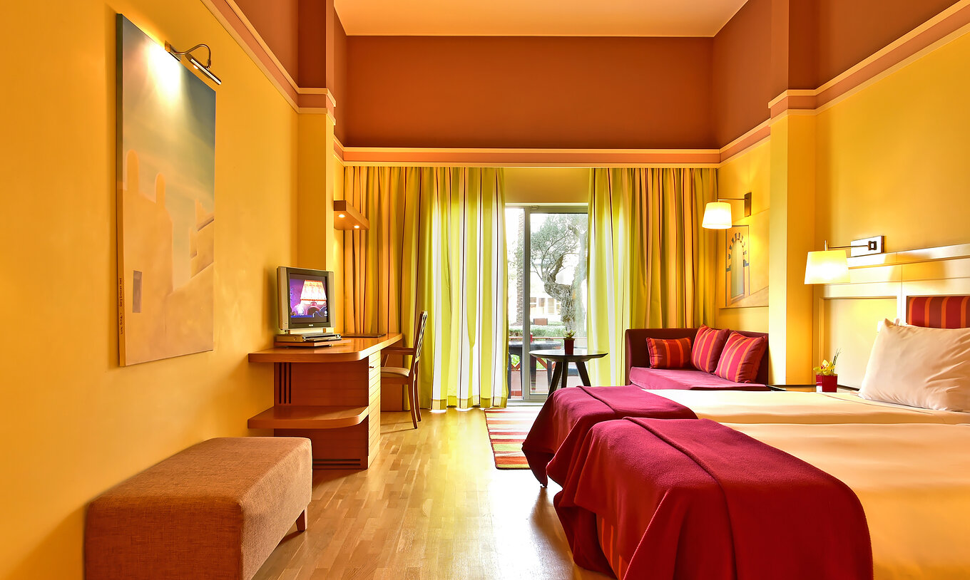 The Superior Double - Pool View of Pestana Sintra Golf has two beds, a picture on the wall, a sofa, and a window