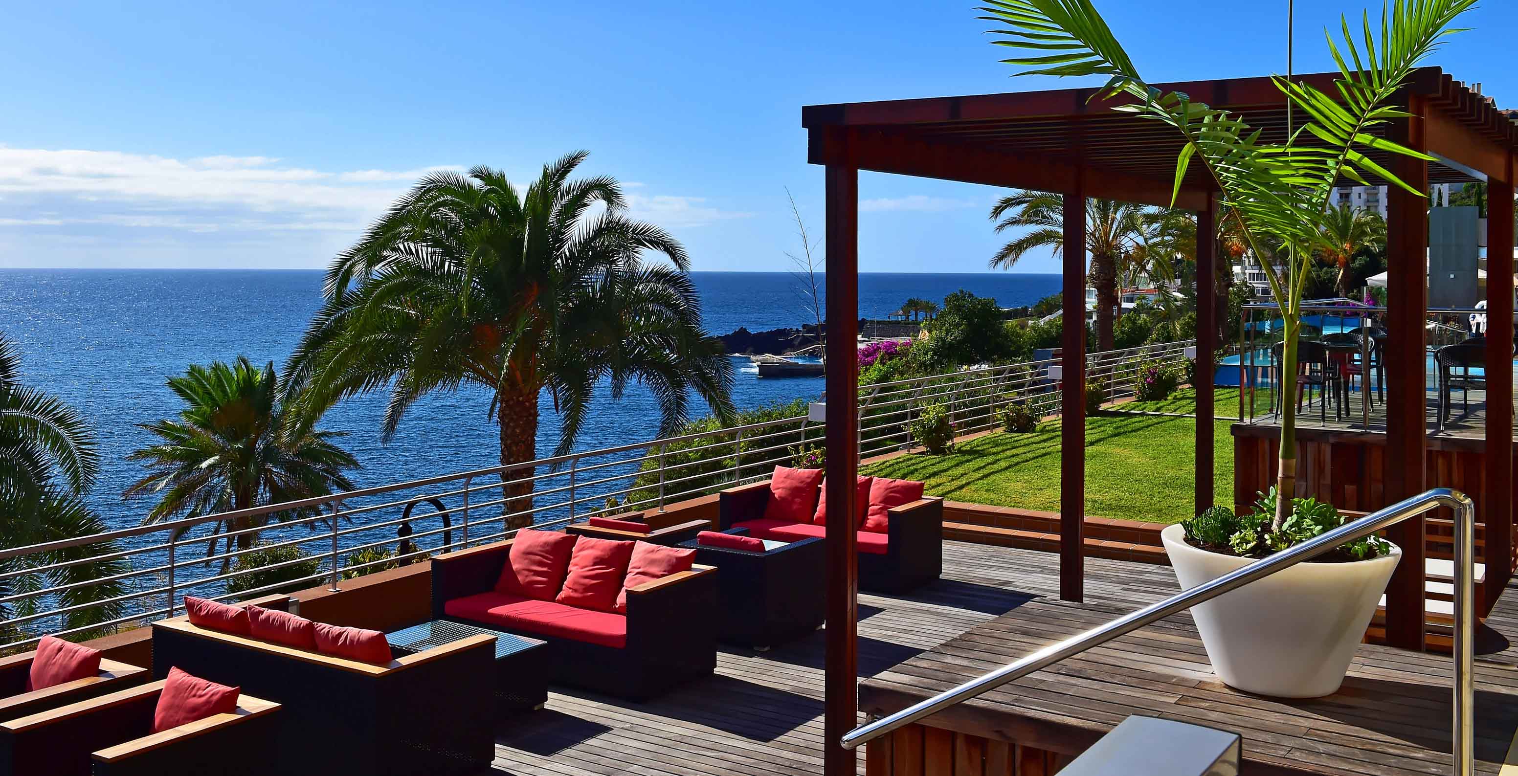 The rooftop of Pestana Promenade has a pool, comfortable sofas and sea view