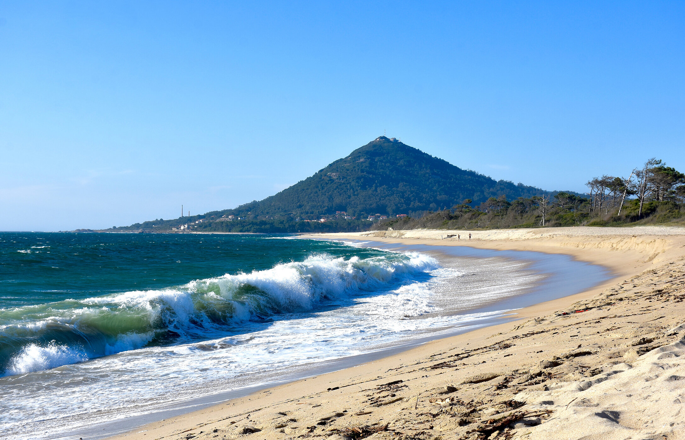 Panoramic view of Moledo Beach surrounded by a beautiful natural setting