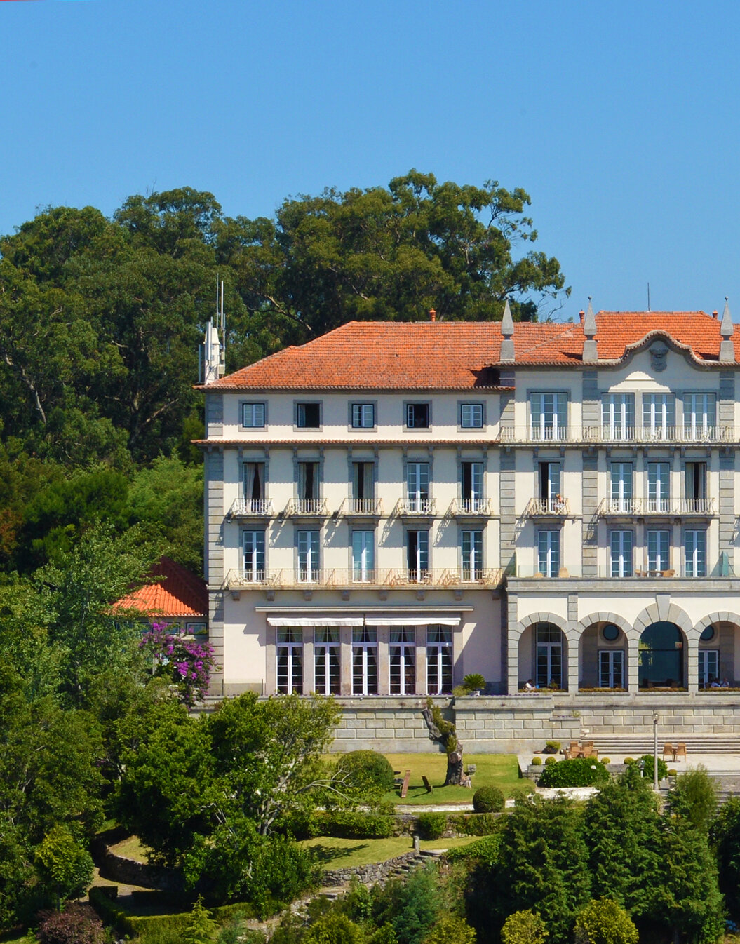 Exterior view of the building of Pousada Viana do Castelo, a historic building on Monte de Santa Luzia, filled with windows