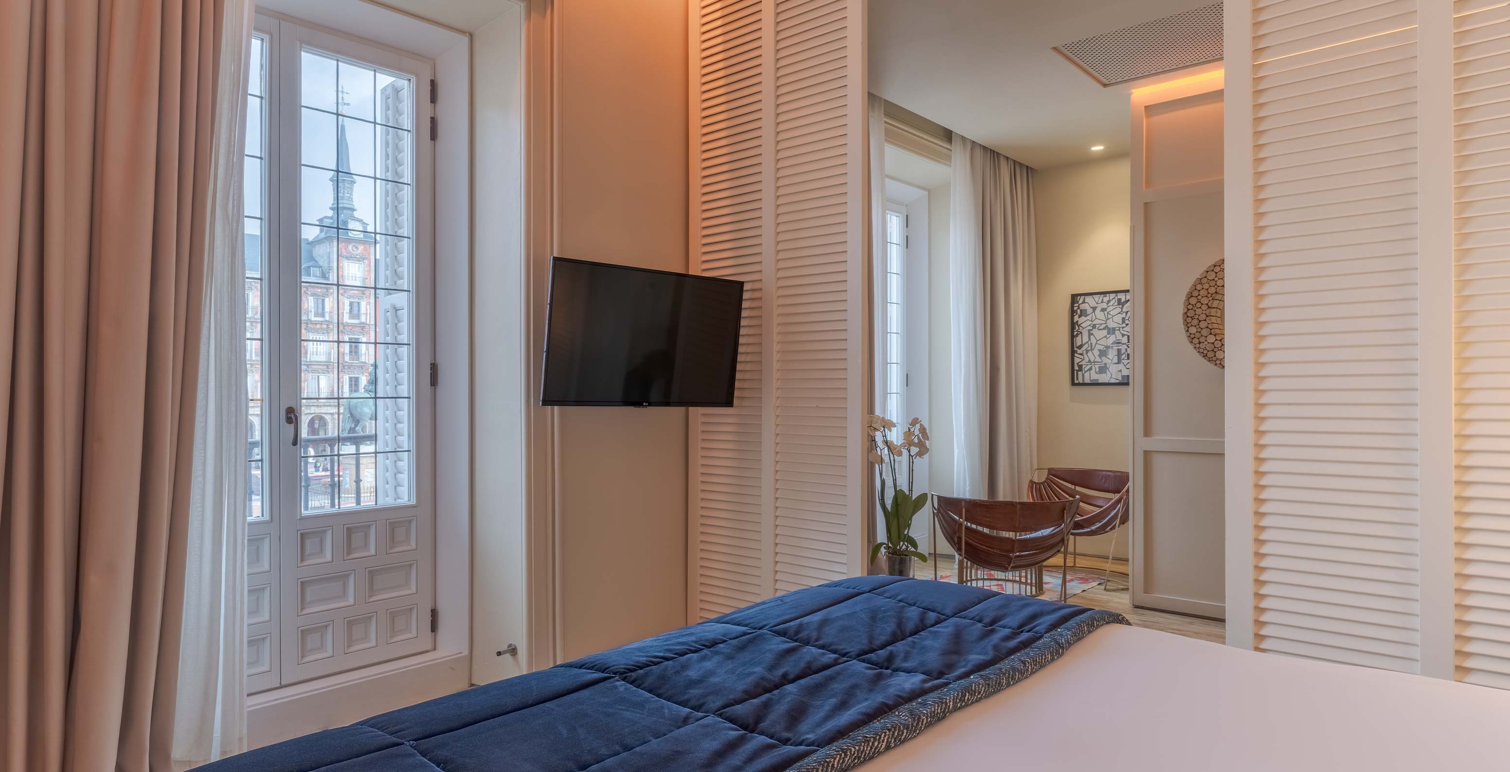 Pestana Collection Plaza Mayor Hotel in the Historic Center of Madrid featuring bright room and balcony view