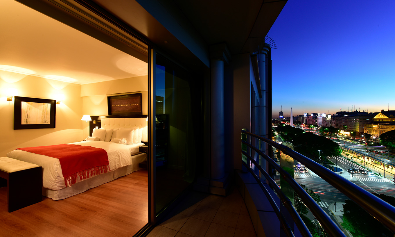 The Queen Suite at Pestana Buenos Aires has a balcony with a panoramic view of downtown Buenos Aires