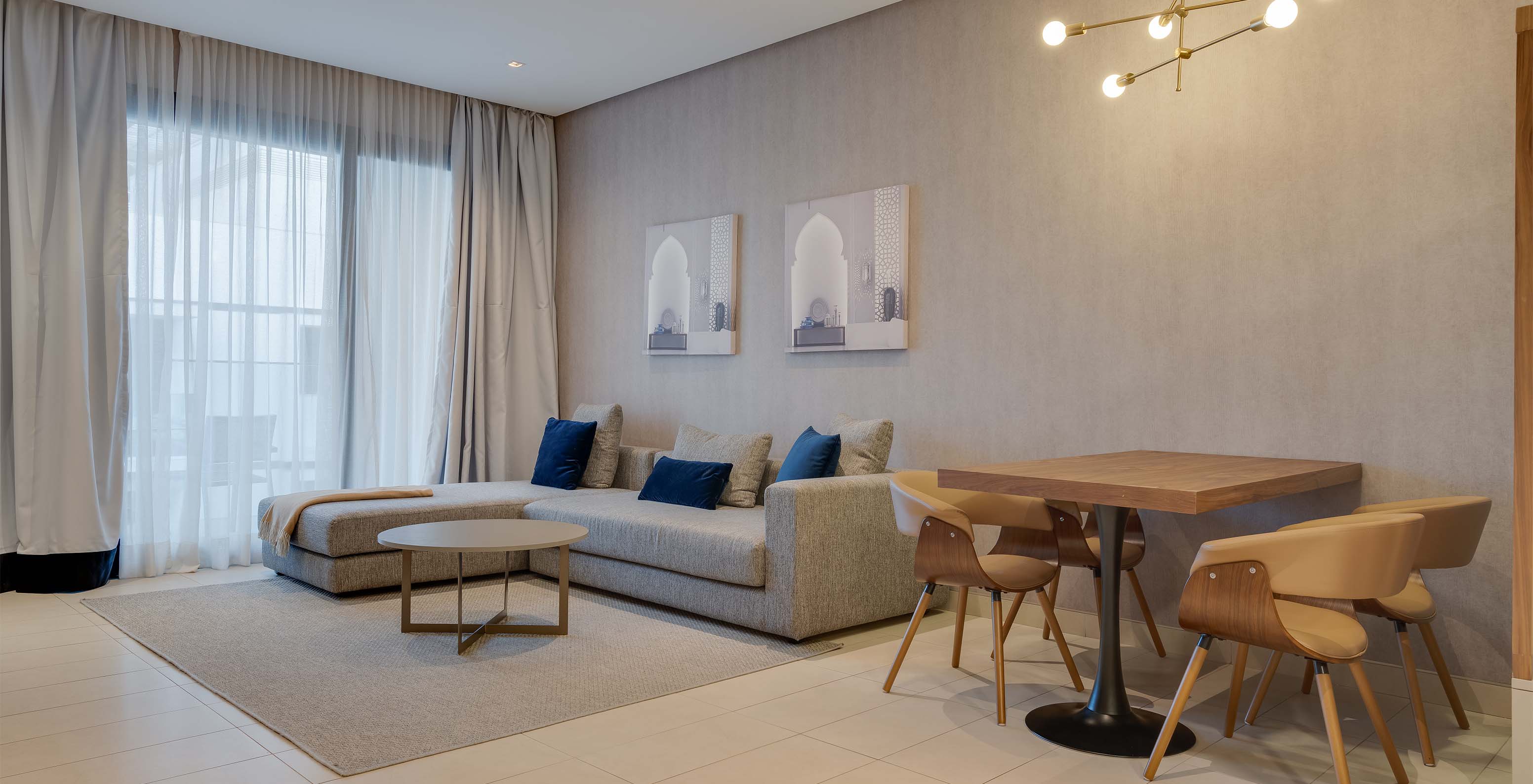 Pestana Casablanca 4-Star Hotel in Casablanca, Morocco featuring a modern lounge with sofa and dining area