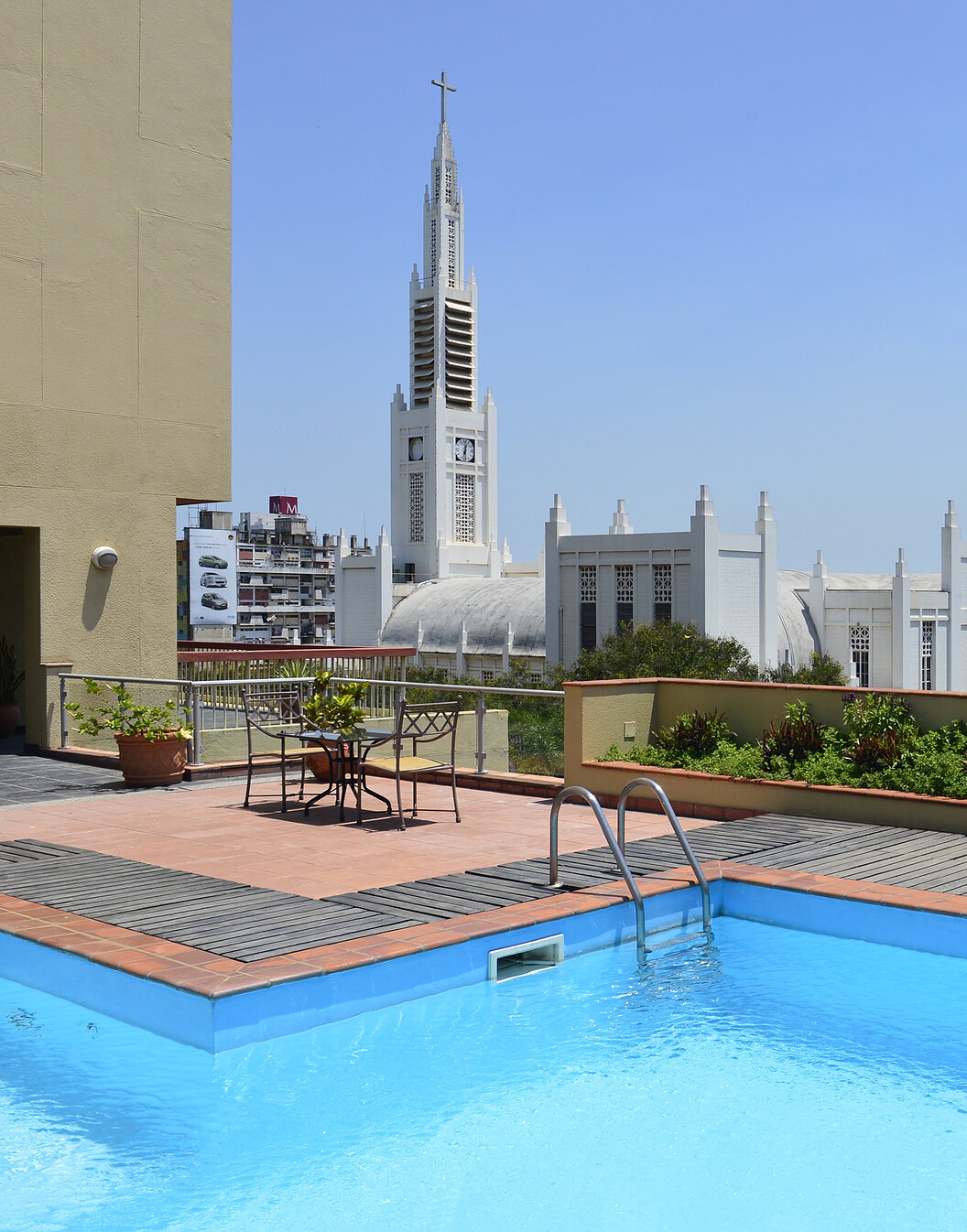 Rooftop with pool overlooking the Cathedral of Maputo at Pestana Rovuma, a 4-star hotel in Maputo
