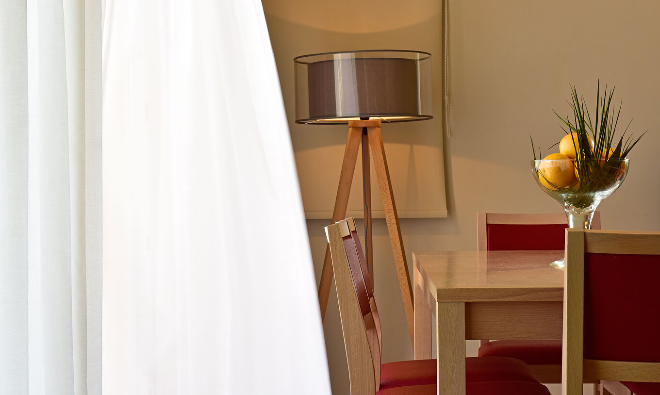 The Standard 2-Bedroom Garden View Villa at Pestana Alvor Beach Villas has white curtains and a dining table