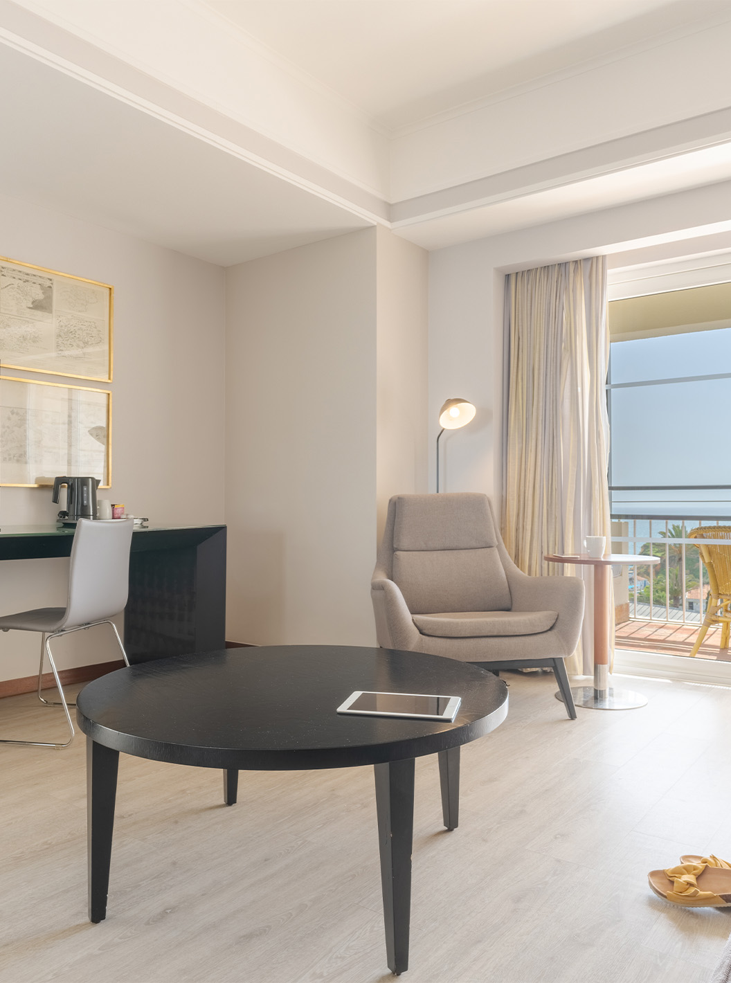The Sea View Suite at Pestana Alvor Praia has a sofa with a coffee table, a desk with TV, and a sea view