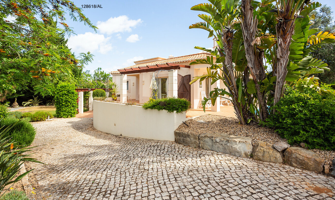 The Pestana Carvoeiro Golf V3 Superior Villa has an exterior patio with grass and trees around it