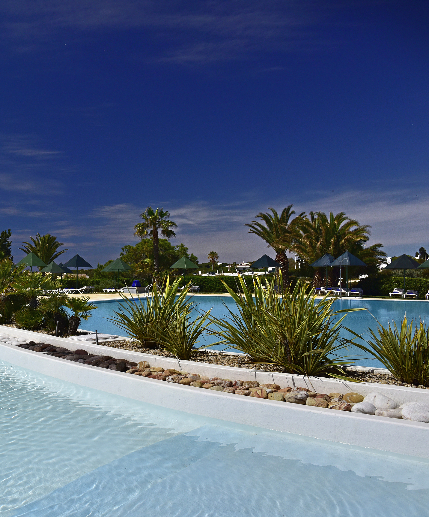 The Pestana Viking, a 4-star hotel in Porches, has a swimming pool for children and one for adults with sun loungers all around