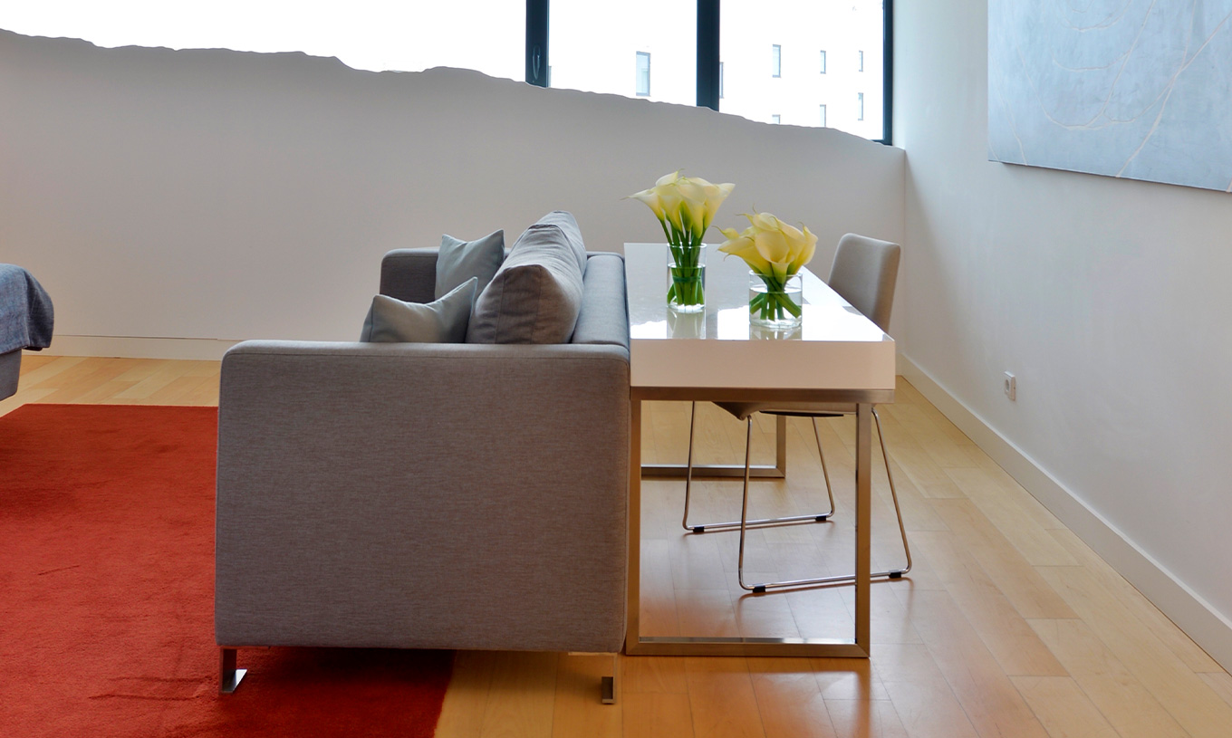 The Superior Double Room at Pestana Cidadela Cascais has a sofa, a desk with a chair, and a window with art