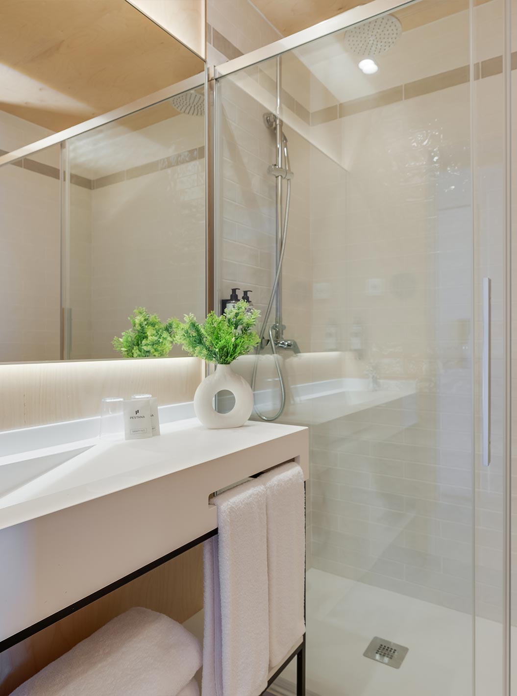Suite Eco Resort at Pestana Dunas Porto Santo ALL INCLUSIVE featuring a bright bathroom with glass shower
