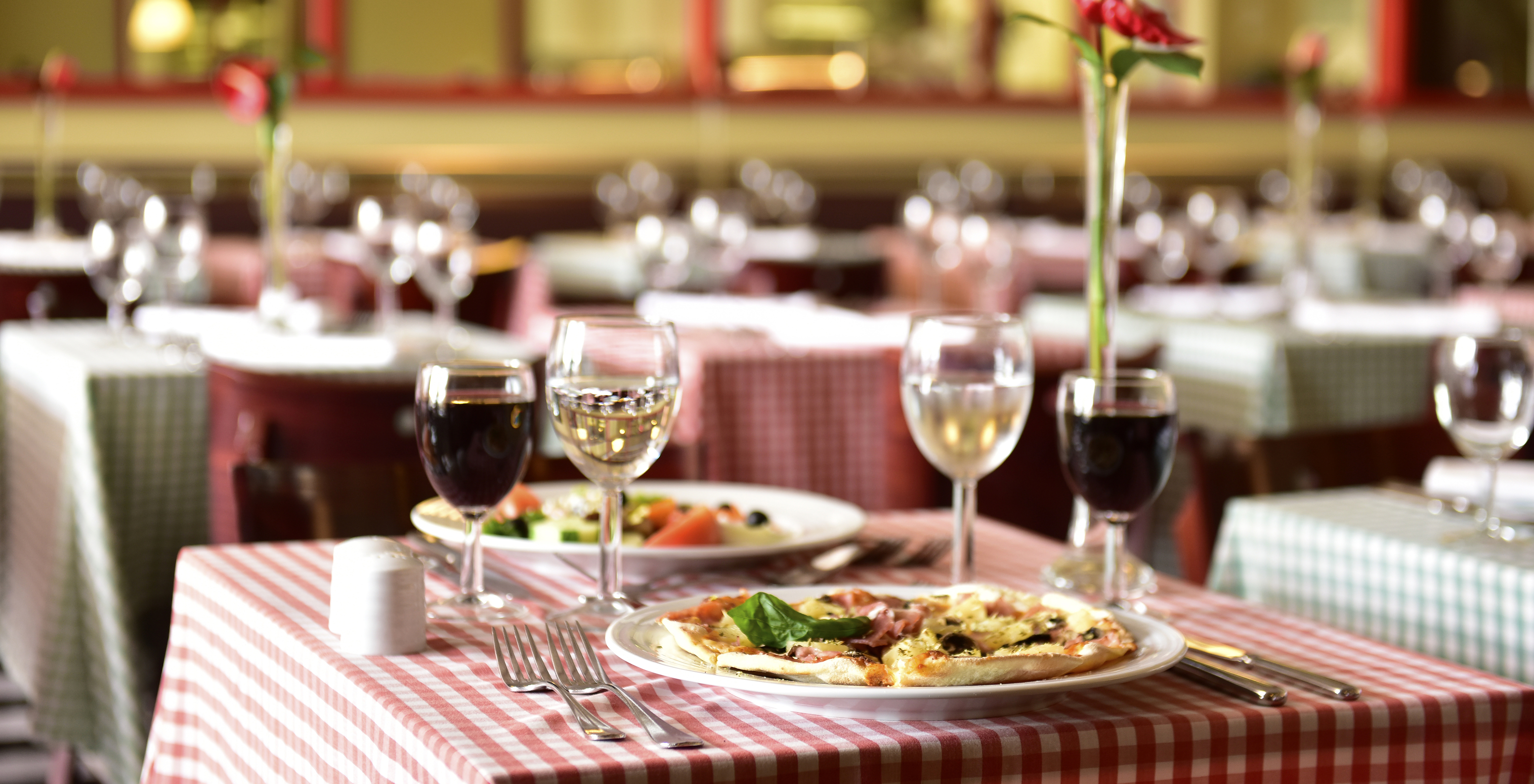 The Luigi restaurant at the 5-Star Resort in Porto Santo serves Italian food like pizza paired with wine