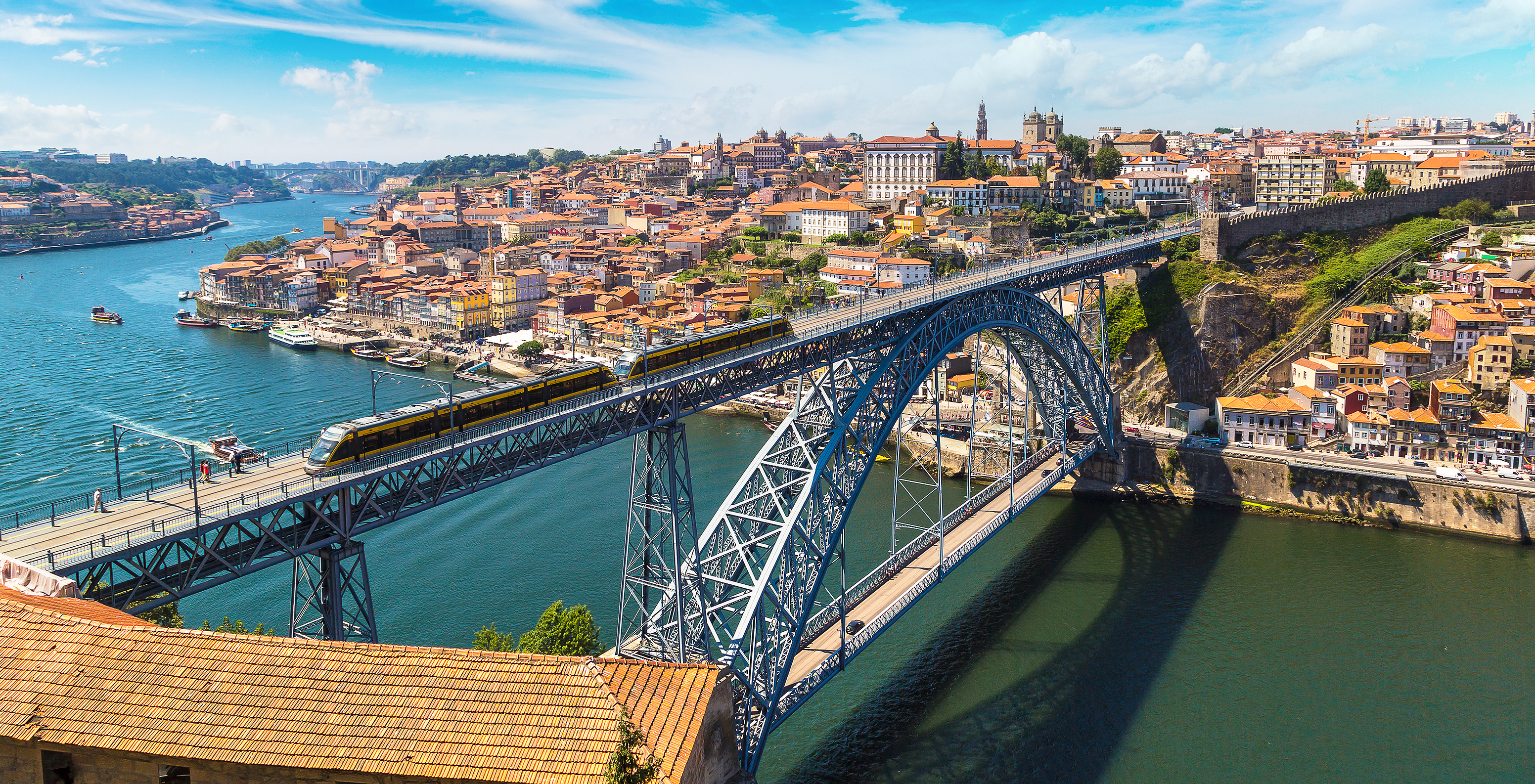Stay at Pestana Vintage Porto and walk across the iconic Dom Luís I Bridge, enjoying views of the Douro River