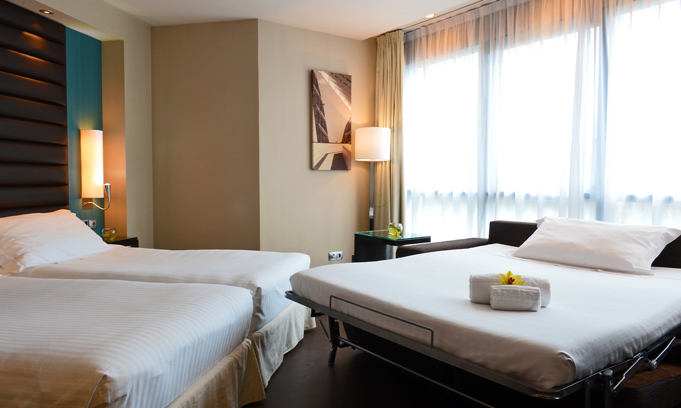 Superior Family room at Pestana Arena Barcelona can have three beds, the third being a sofa bed