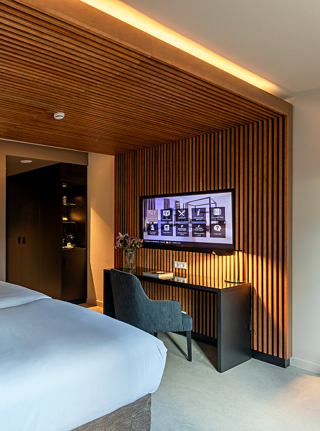 Executive room at Pestana Amsterdam Riverside has two single beds, TV in front of the bed, and a desk