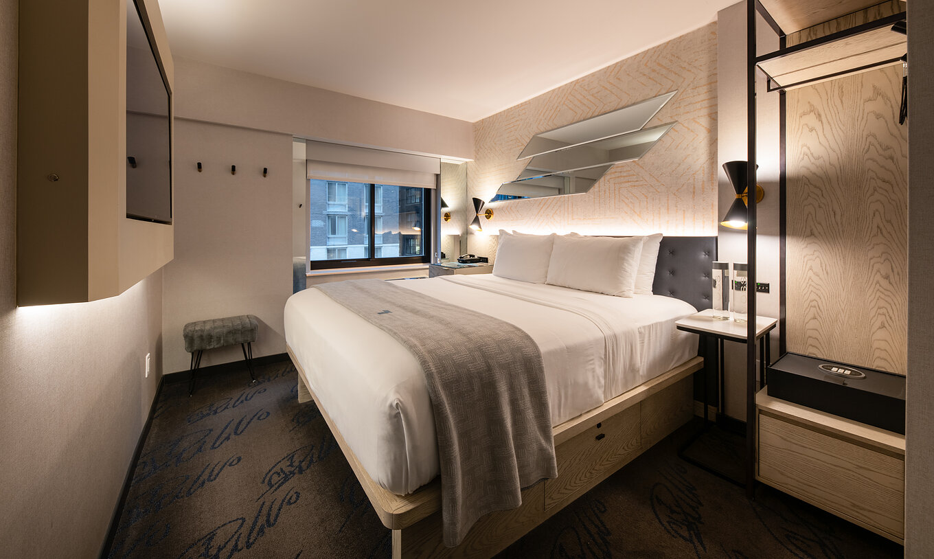The Comfort Street View ADA at Pestana CR7 Times Square has a double bed, TV, and a wardrobe