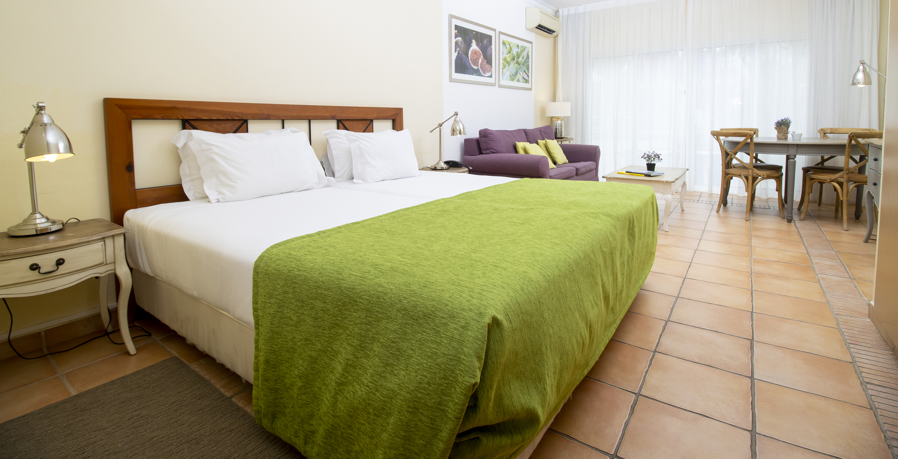 L'Étude du Pestana Palm Gardens a une kitchenette avec cuisinière, machine à laver et vaisselle