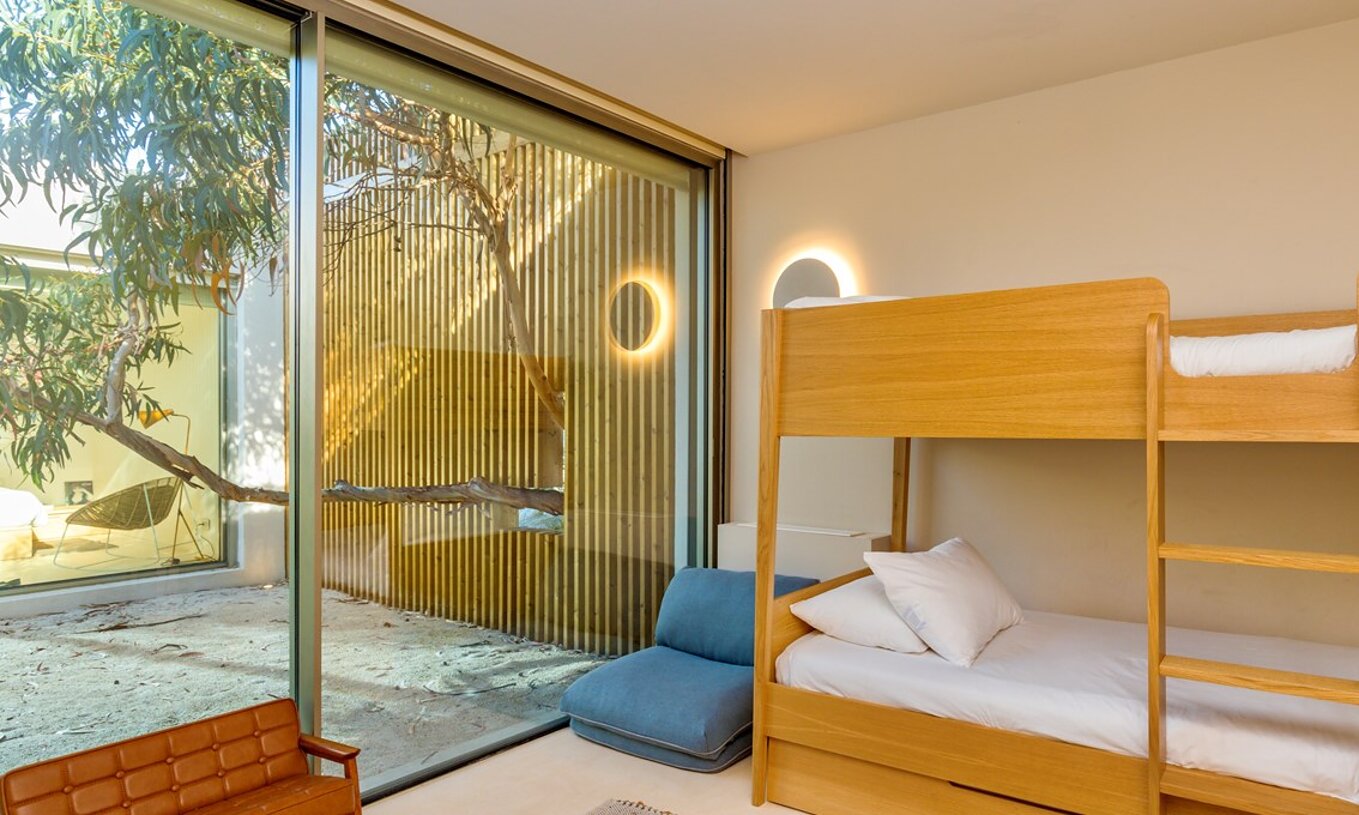 As Exclusive Premium Villas com Piscina Privada do Pestana Tróia Eco Resort têm um quarto com beliches de duas camas