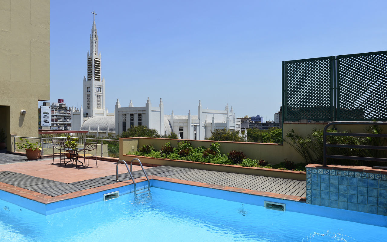 Rooftop with pool overlooking the Cathedral of Maputo at Pestana Rovuma, a 4-star hotel in Maputo