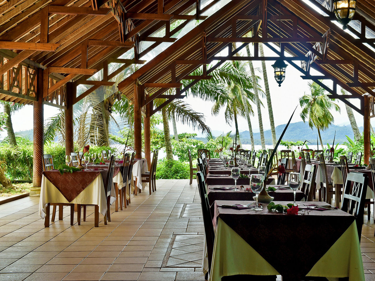 7 Pedras restaurant, in São Tomé has open-air, wooden roof, sea view
