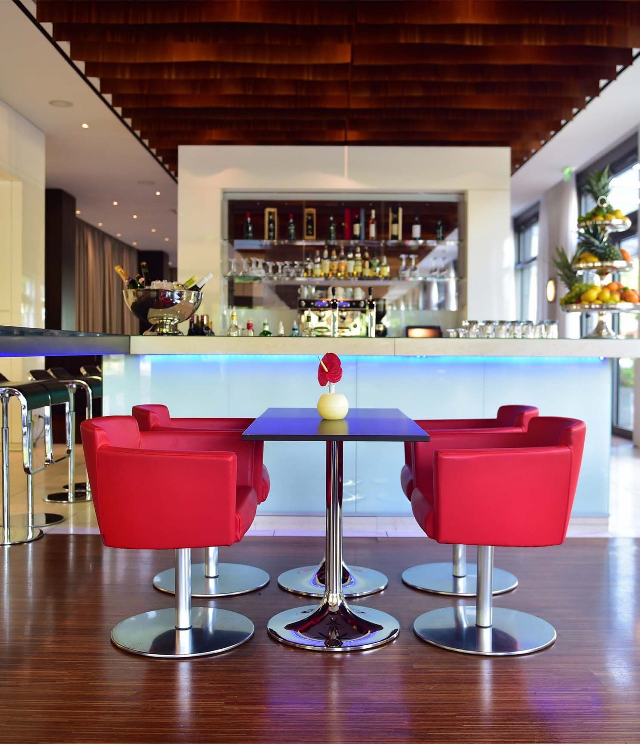 Aqua Bar & Lounge’s intimate setup is perfect for enjoying cocktails in a comfortable setting