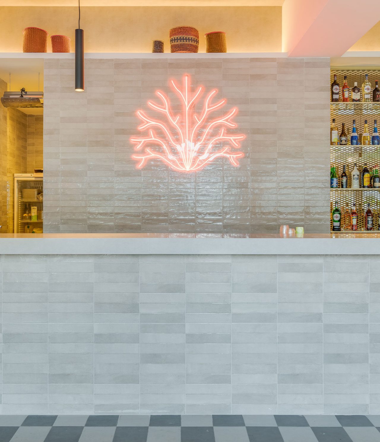 Coral Bar features a unique LED light in a coral shape above its bar counter