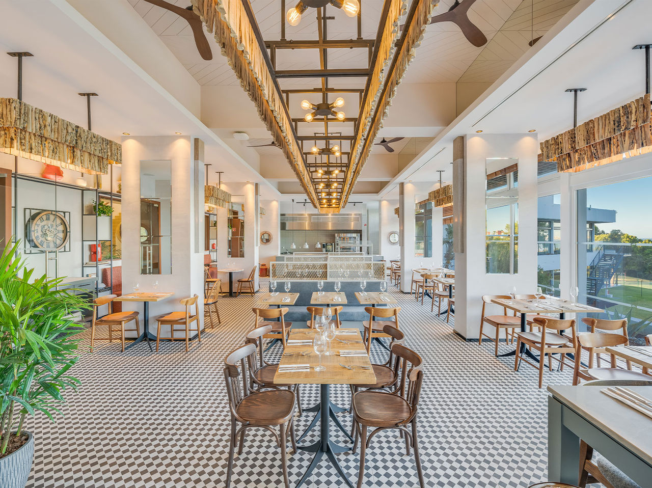 Fuego restaurant at the Algarve All-Inclusive Hotel has modern decor and tables with garden views