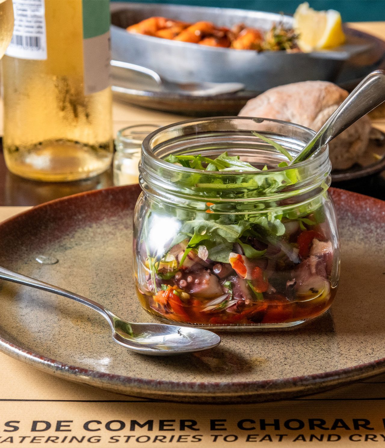 Restaurant Taberna da Praça, in a 5-Star Hotel in Cascais, serves octopus salad in a jar