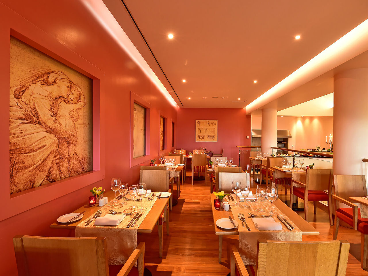 The Trattoria de La Fontana at a 5-star Funchal hotel has a red-walled space