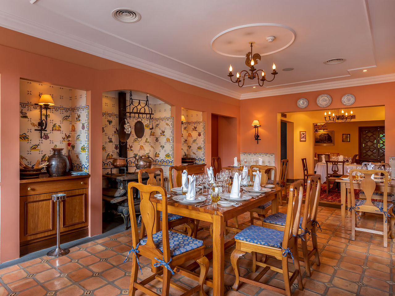 The Mediterranean Restaurant, at the Romantic Hotel in Funchal, Madeira, has antique decor and several rooms