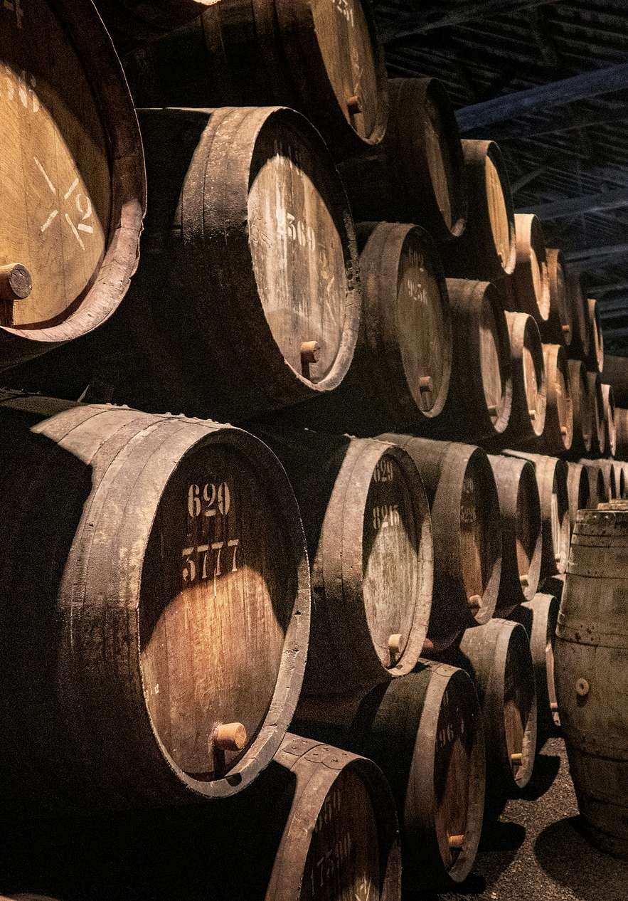 Port wine cellars with underground barrels where wine ages acquiring characteristic complexity and flavor