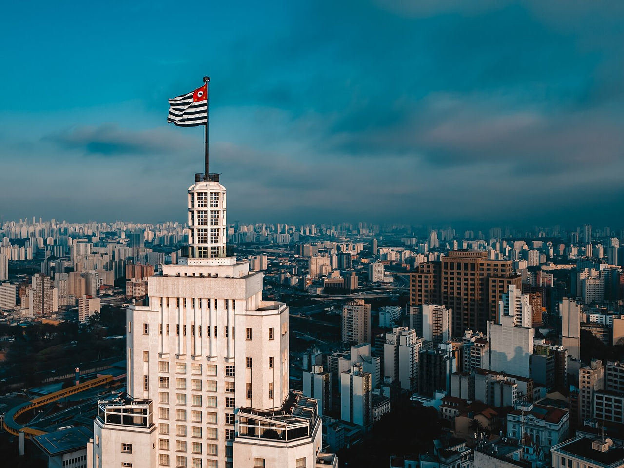 Aerial view of a tall building in São Paulo, highlighting the urban landscape