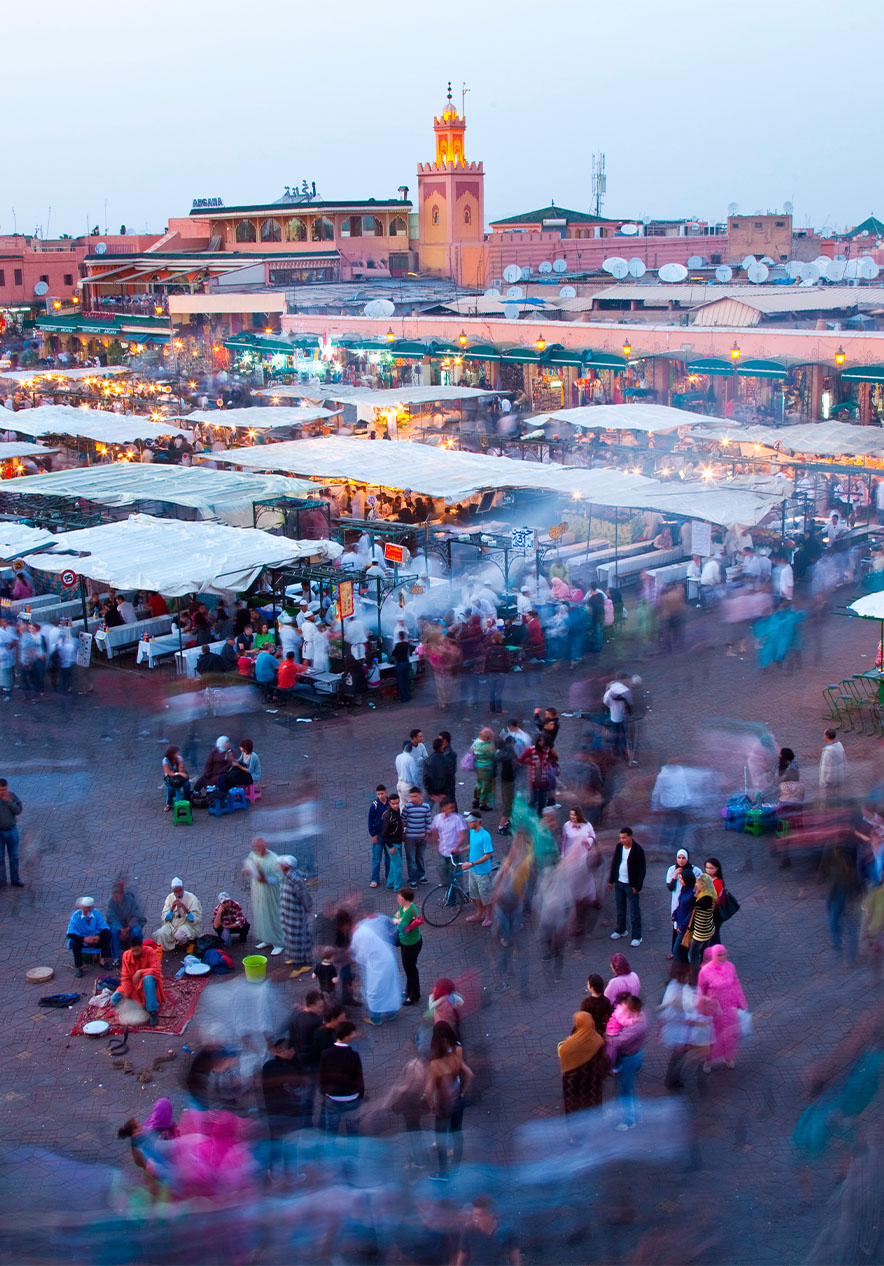 Jemaa el-Fnaa in Marrakech is a vibrant bustling square full of life during the day and night