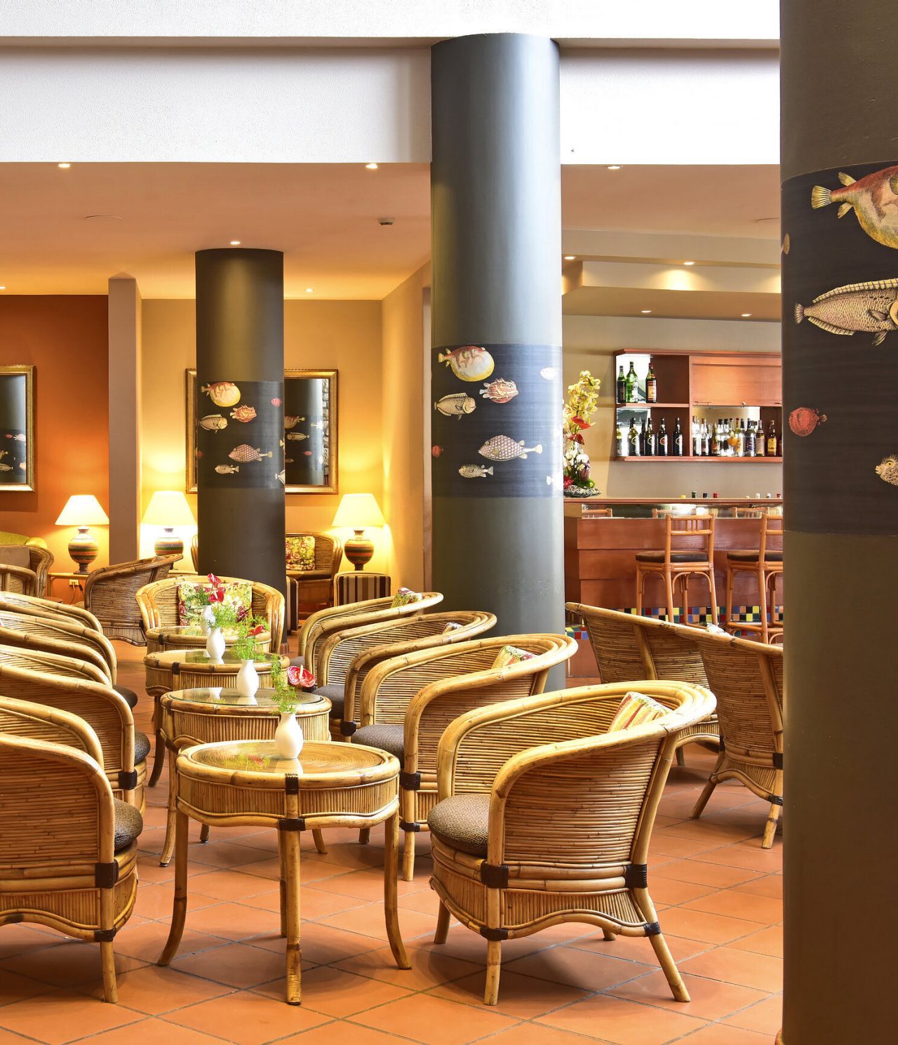 The Arlequim Bar at a 5-Star Hotel in Funchal has several tables and serves drinks